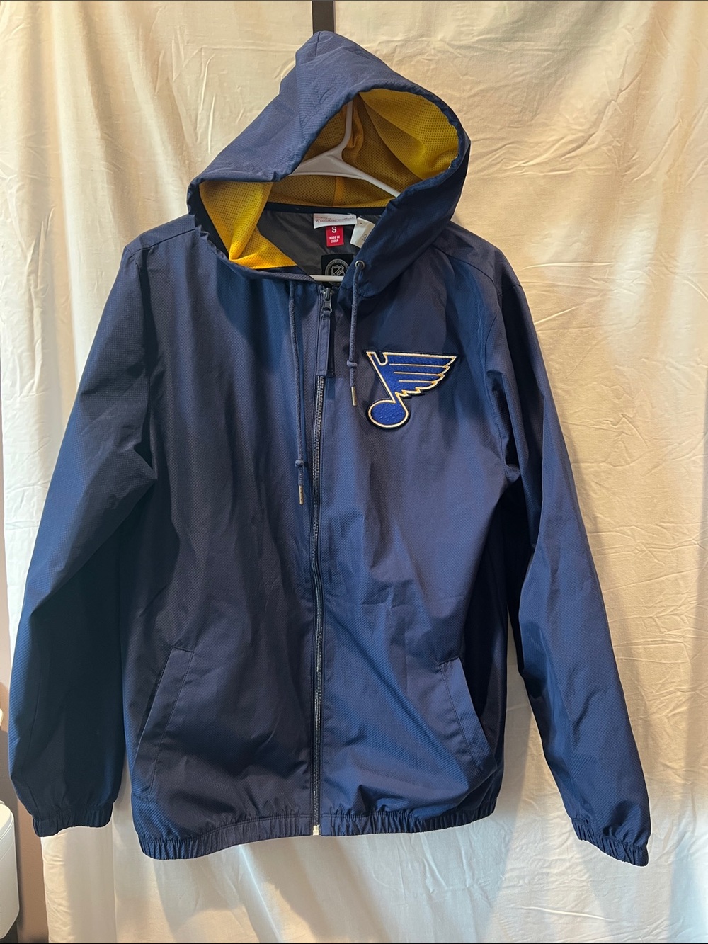 Mitchell & Ness navy St. Louis Blue NHL jacket. Small, lightweight